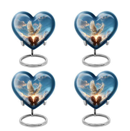 Twilight Blue Dove Cremation Urn angled view of lid and engraved motif - compassionate heart-dove combination with gentle curves - 10 inch aluminum urn for cremated remains