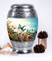 Large urn for human ashes with vibrant, lively butterflies design, designed as a loving tribute for a mother