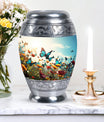 Large urn for human ashes with vibrant, lively butterflies design, designed as a loving tribute for a mother