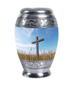 Christ Urn in blue sky for cremation Or Memorial Day