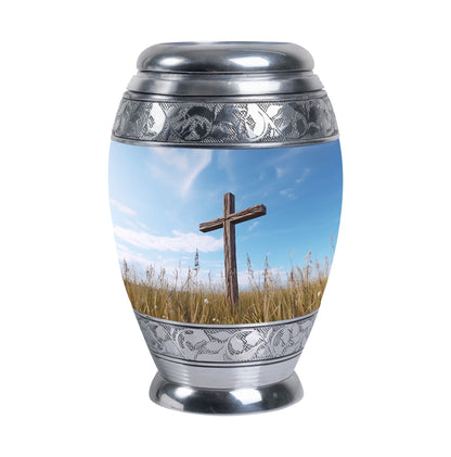Christ Urn in blue sky for cremation Or Memorial Day