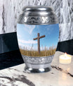 Christ Urn in blue sky for cremation Or Memorial Day