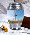 Christ Urn in blue sky for cremation Or Memorial Day
