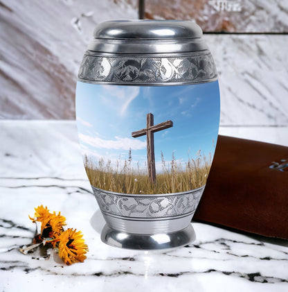 Christ Urn in blue sky for cremation Or Memorial Day