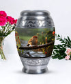 Classic sparrow cremation urn in aluminum.