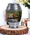 Classic sparrow cremation urn in aluminum.
