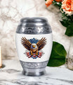 Classic urn featuring an eagle with an American flag.