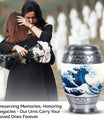 Large, white, decorative cremation urn for men with ocean waves design, suitable for adult ashes
