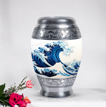 Large, white, decorative cremation urn for men with ocean waves design, suitable for adult ashes