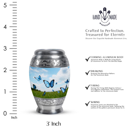 Steel Blue Butterfly Cremation Urn lifestyle display on memorial shelf - royal butterfly engraving with decorative scrollwork - mini keepsake memorial for portion of cremation ashes