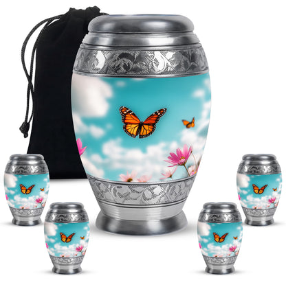 Jewel Teal Butterfly Cremation Urn detail view - regal butterfly design with crown-inspired accents - memorial set with one large and four small urns