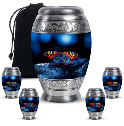 Deep Black Butterfly Cremation Urn detail view - regal butterfly design with crown-inspired accents - memorial set with one large and four small urns