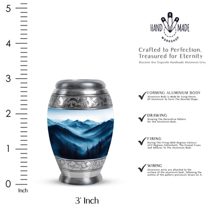 Brushed Silver Blue Cremation Urn lifestyle display on memorial shelf - ornate monarch-style blue relief on brushed aluminum - mini keepsake memorial for portion of cremation ashes