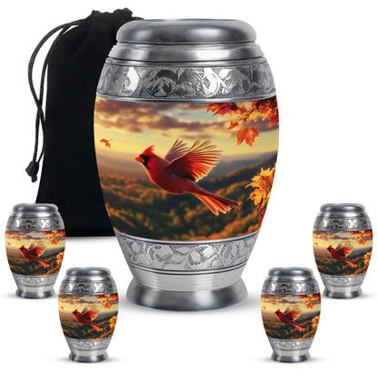 Sunrise Gold Cardinal Cremation Urn detail view - ornate monarch-style cardinal relief on brushed aluminum - memorial set with one large and four small urns