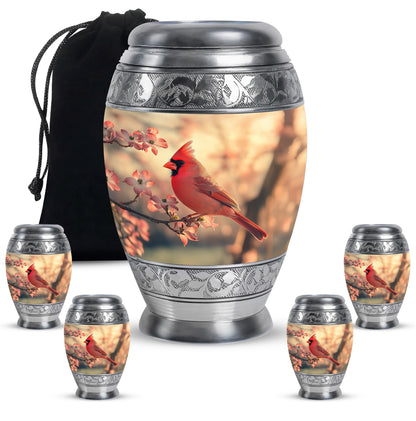 Royal Gold Cardinal Cremation Urn detail view - majestic cardinal pattern with filigree border - memorial set with one large and four small urns