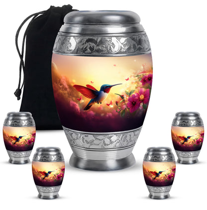 Amber Gold Hummingbird Cremation Urn detail view - ornate monarch-style hummingbird relief on brushed aluminum - memorial set with one large and four small urns