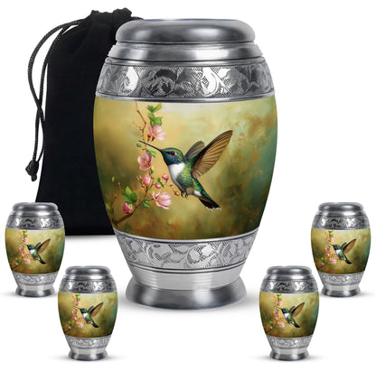 Champagne Gold Hummingbird Cremation Urn detail view - ornate monarch-style hummingbird relief on brushed aluminum - memorial set with one large and four small urns