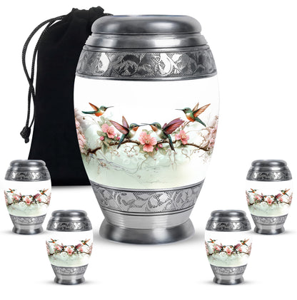 Sterling Silver Hummingbird Cremation Urn detail view - regal hummingbird design with crown-inspired accents - memorial set with one large and four small urns