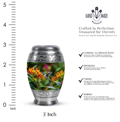 Honey Yellow Hummingbird Cremation Urn lifestyle display on memorial shelf - royal hummingbird engraving with decorative scrollwork - mini keepsake memorial for portion of cremation ashes