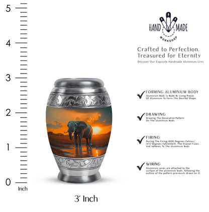 Amber Gold Elephant Cremation Urn lifestyle display on memorial shelf - ornate monarch-style elephant relief on brushed aluminum - mini keepsake memorial for portion of cremation ashes