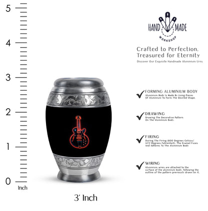 Jet Black Guitar Cremation Urn lifestyle display on memorial shelf - ornate monarch-style guitar relief on brushed aluminum - mini keepsake memorial for portion of cremation ashes