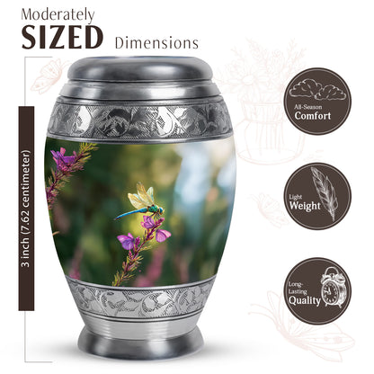 Pine Green Dragonfly Cremation Urn lifestyle display on memorial shelf - majestic dragonfly pattern with filigree border - mini keepsake memorial for portion of cremation ashes
