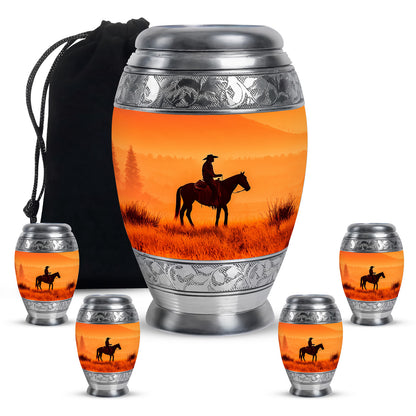 Sunrise Gold Cowboy Cremation Urn detail view - ornate monarch-style cowboy relief on brushed aluminum - memorial set with one large and four small urns