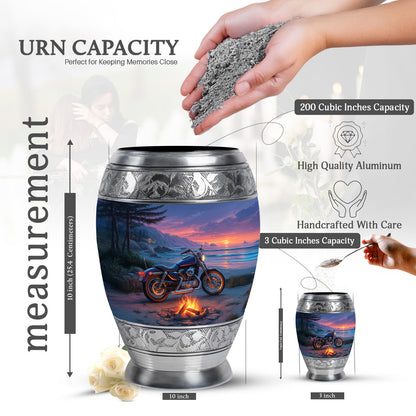Misty Blue Bike Cremation Urn lifestyle display on memorial shelf - ornate monarch-style bike relief on brushed aluminum - mini keepsake memorial for portion of cremation ashes