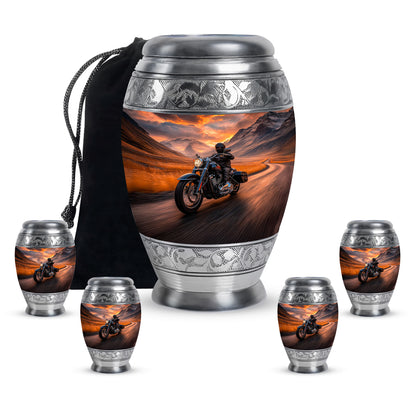 Burgundy Red Bike Cremation Urn detail view - ornate monarch-style bike relief on brushed aluminum - memorial set with one large and four small urns