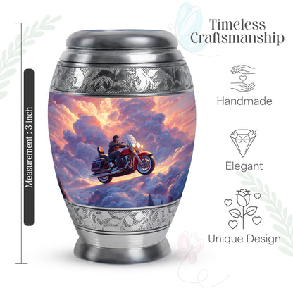 Steel Blue Bike Cremation Urn lifestyle display on memorial shelf - royal bike engraving with decorative scrollwork - mini keepsake memorial for portion of cremation ashes