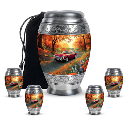 Matte Gold Car Cremation Urn detail view - royal car engraving with decorative scrollwork - memorial set with one large and four small urns