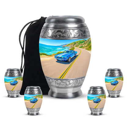 Vivid Blue Car Cremation Urn detail view - majestic car pattern with filigree border - memorial set with one large and four small urns