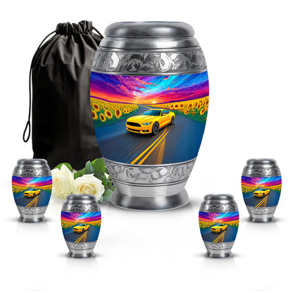 Dusty Blue Car Cremation Urn detail view - ornate monarch-style car relief on brushed aluminum - memorial set with one large and four small urns