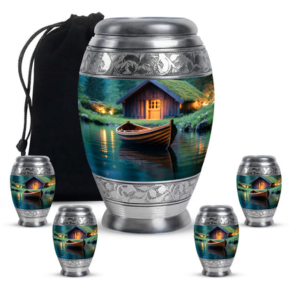 Jade Green Boat Cremation Urn detail view - ornate monarch-style boat relief on brushed aluminum - memorial set with one large and four small urns