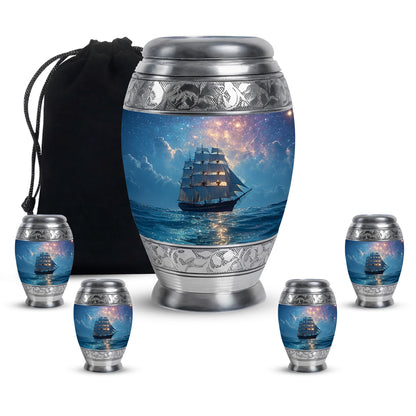 Slate Blue Boat Cremation Urn detail view - ornate monarch-style boat relief on brushed aluminum - memorial set with one large and four small urns
