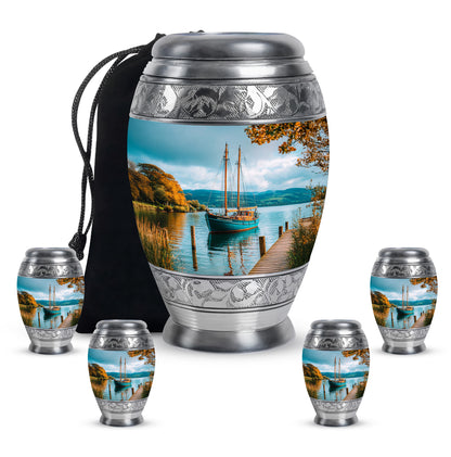 Vivid Teal Boat Cremation Urn detail view - royal boat engraving with decorative scrollwork - memorial set with one large and four small urns