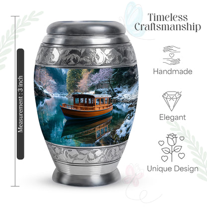 Cornflower Blue Boat Cremation Urn lifestyle display on memorial shelf - royal boat engraving with decorative scrollwork - mini keepsake memorial for portion of cremation ashes