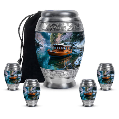 Pastel Blue Boat Cremation Urn detail view - regal boat design with crown-inspired accents - memorial set with one large and four small urns