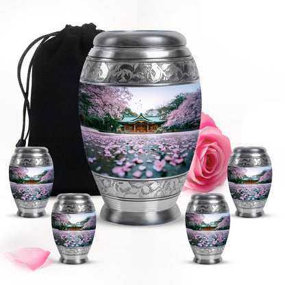Pure White Cherry Blossom Cremation Urn detail view - ornate monarch-style cherry blossom relief on brushed aluminum - memorial set with one large and four small urns