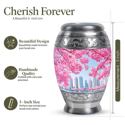 Dusty Blue Cherry Blossom Cremation Urn lifestyle display on memorial shelf - regal cherry blossom design with crown-inspired accents - mini keepsake memorial for portion of cremation ashes