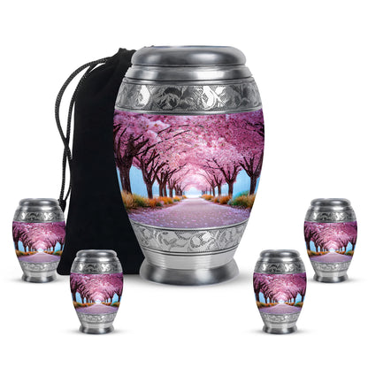 Blush Pink Cherry Blossom Cremation Urn detail view - ornate monarch-style cherry blossom relief on brushed aluminum - memorial set with one large and four small urns