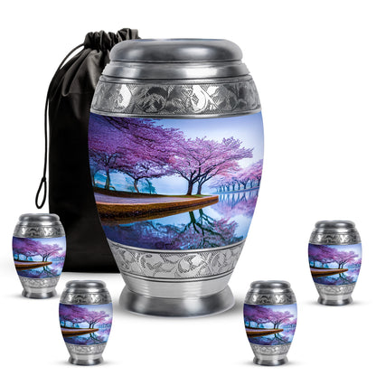 Steel Blue Cherry Blossom Cremation Urn detail view - majestic cherry blossom pattern with filigree border - memorial set with one large and four small urns