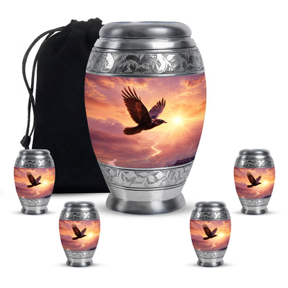 Coral Pink Crow Cremation Urn detail view - regal crow design with crown-inspired accents - memorial set with one large and four small urns