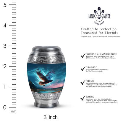 Pastel Blue Crow Cremation Urn lifestyle display on memorial shelf - ornate monarch-style crow relief on brushed aluminum - mini keepsake memorial for portion of cremation ashes