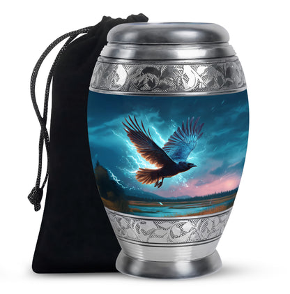 Indigo Crow Cremation Urn back view with polished surface - ornate monarch-style crow relief on brushed aluminum - full-size 10 inch 200 cubic inch adult cremation urn