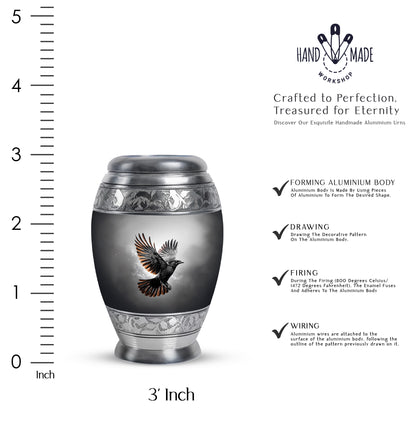 Onyx Black Crow Cremation Urn lifestyle display on memorial shelf - majestic crow pattern with filigree border - mini keepsake memorial for portion of cremation ashes