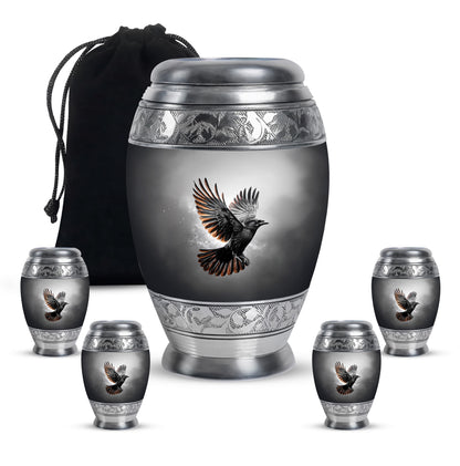 Ebony Crow Cremation Urn detail view - regal crow design with crown-inspired accents - memorial set with one large and four small urns