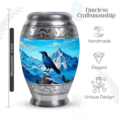 Sky Blue Crow Cremation Urn lifestyle display on memorial shelf - regal crow design with crown-inspired accents - mini keepsake memorial for portion of cremation ashes