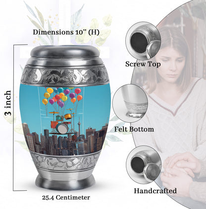 Slate Blue Drums Cremation Urn lifestyle display on memorial shelf - regal drums design with crown-inspired accents - mini keepsake memorial for portion of cremation ashes
