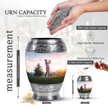 Moonlight Silver Golf Cremation Urn lifestyle display on memorial shelf - royal golf engraving with decorative scrollwork - mini keepsake memorial for portion of cremation ashes